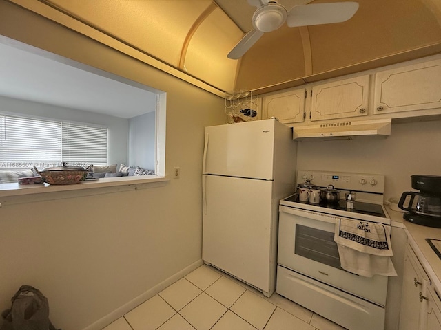 kitchen featuring white appliances, ceiling fan, white cabinetry, and light tile patterned floors