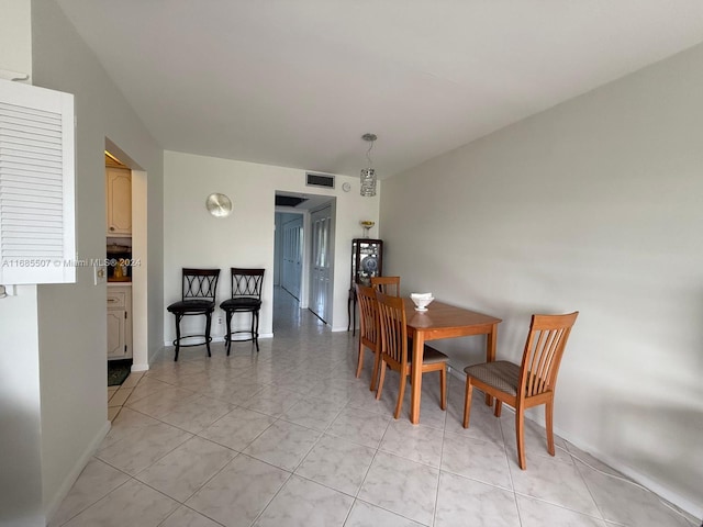 view of tiled dining space