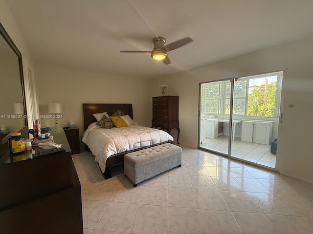 bedroom featuring access to exterior, light tile patterned flooring, and ceiling fan