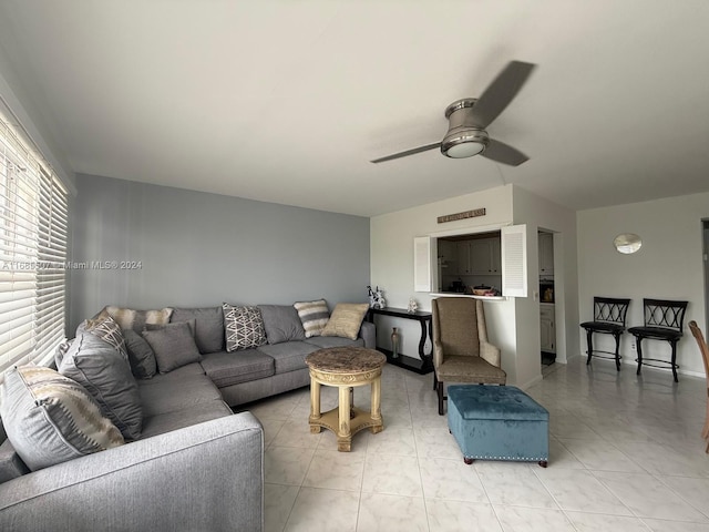 living room featuring ceiling fan