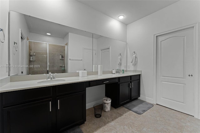 bathroom with vanity and walk in shower