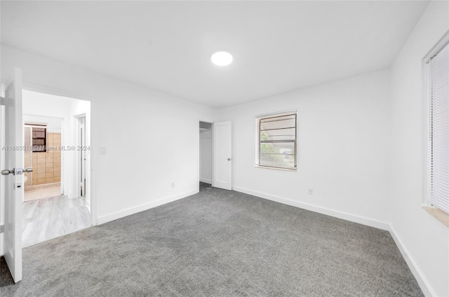 unfurnished bedroom featuring carpet floors