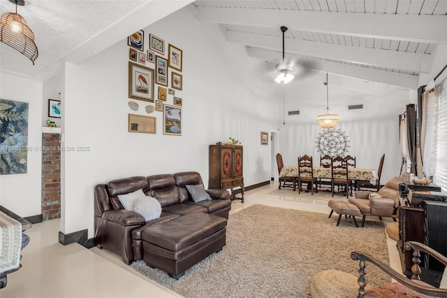 living room with lofted ceiling with beams