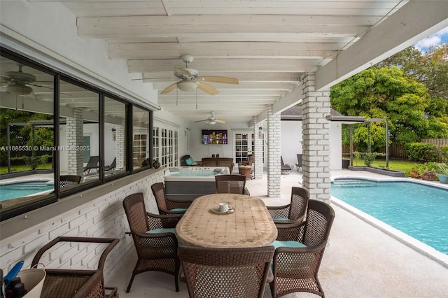 view of pool featuring a patio and ceiling fan