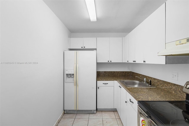 kitchen with extractor fan, white fridge with ice dispenser, sink, stainless steel range with electric cooktop, and white cabinets