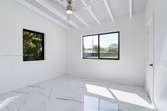 unfurnished room with lofted ceiling with beams, ceiling fan, and wooden ceiling