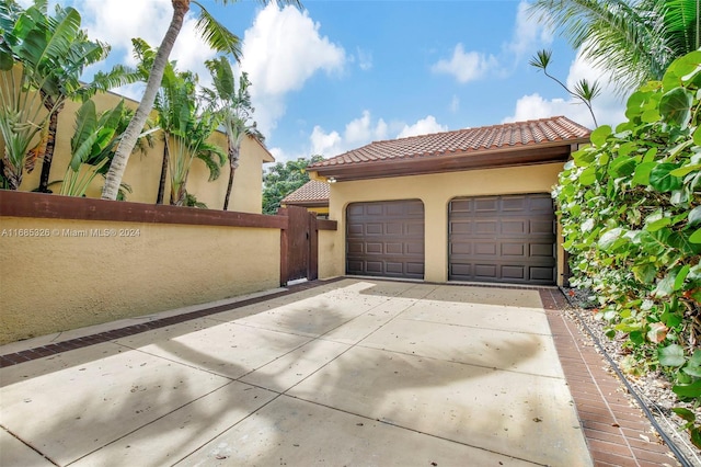 exterior space with a garage