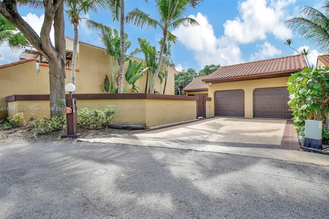 view of front of home with a garage