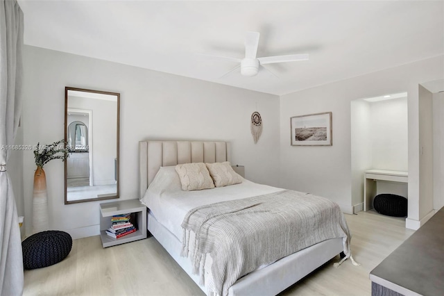 bedroom featuring ceiling fan and light wood-type flooring