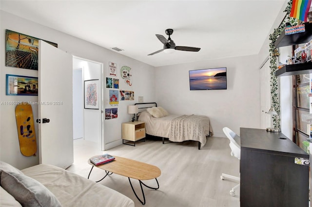 bedroom featuring ceiling fan and light hardwood / wood-style floors