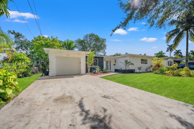 ranch-style house with a front lawn and a garage