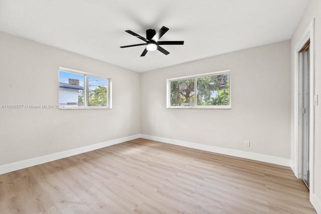 unfurnished bedroom with light hardwood / wood-style floors and ceiling fan