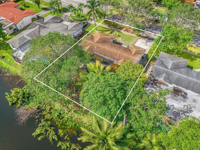 birds eye view of property featuring a water view