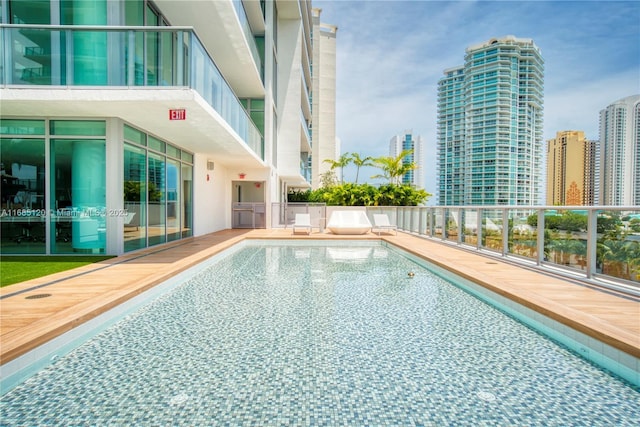 community pool featuring a view of city