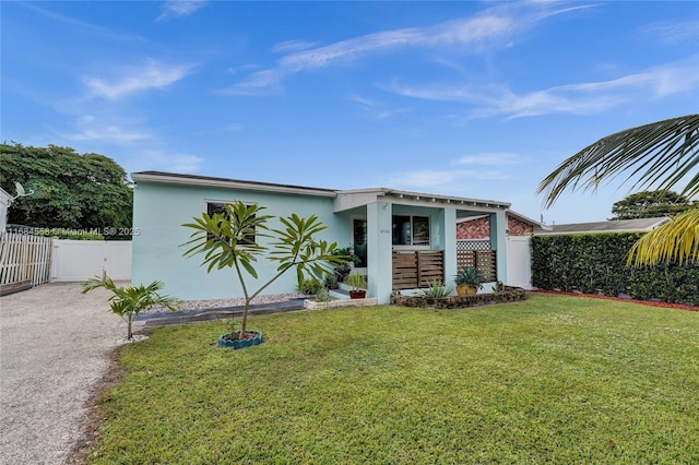 view of outbuilding with a lawn