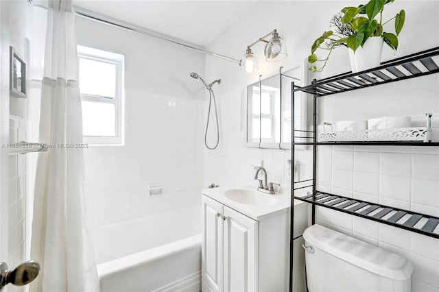 full bathroom with vanity, shower / bathtub combination with curtain, and toilet