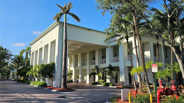 view of building exterior featuring a carport