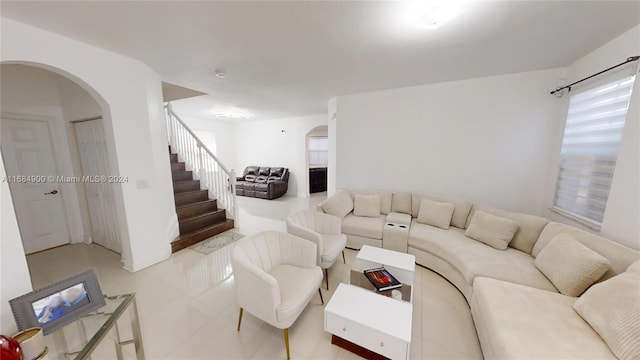 living room with light tile patterned floors