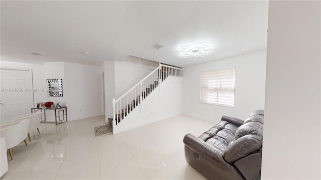 living room featuring light tile patterned floors