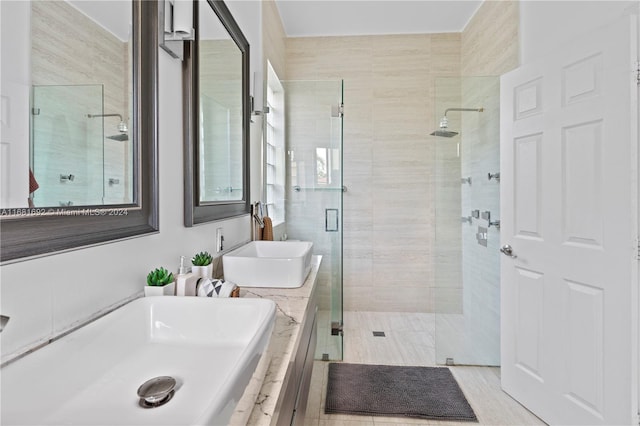 bathroom featuring vanity and walk in shower