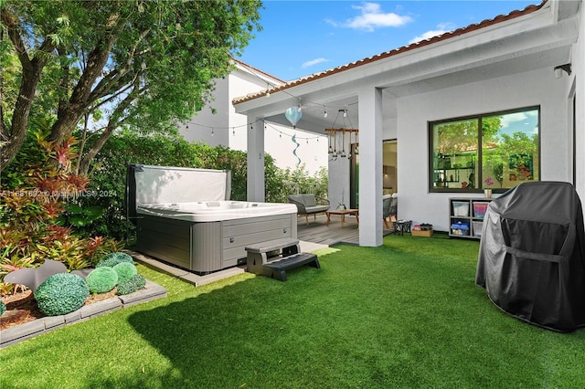 view of yard featuring a hot tub