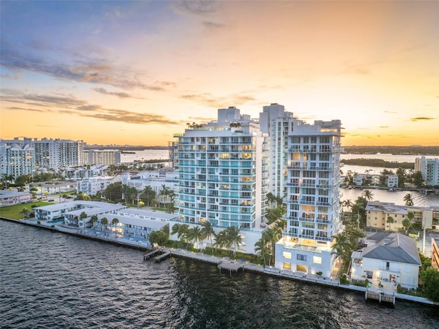 outdoor building at dusk with a water view