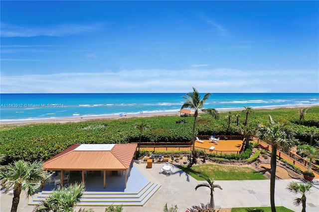 view of water feature with a beach view