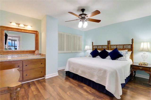 bedroom featuring dark wood-type flooring and ceiling fan