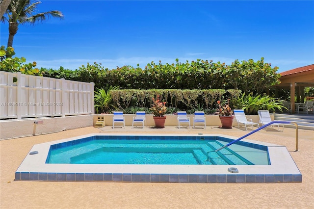 view of swimming pool featuring a patio