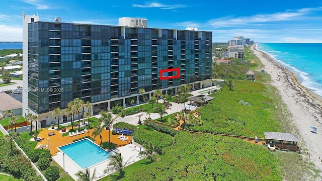 aerial view with a view of the beach and a water view