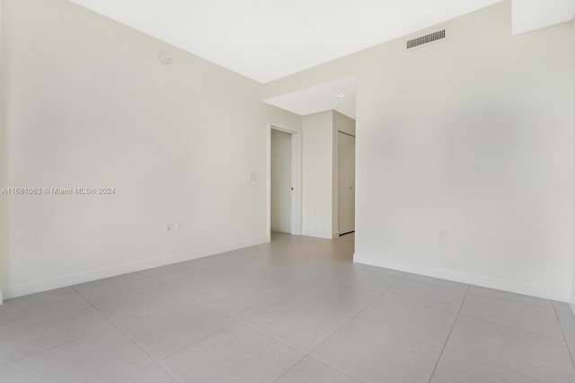 view of tiled spare room