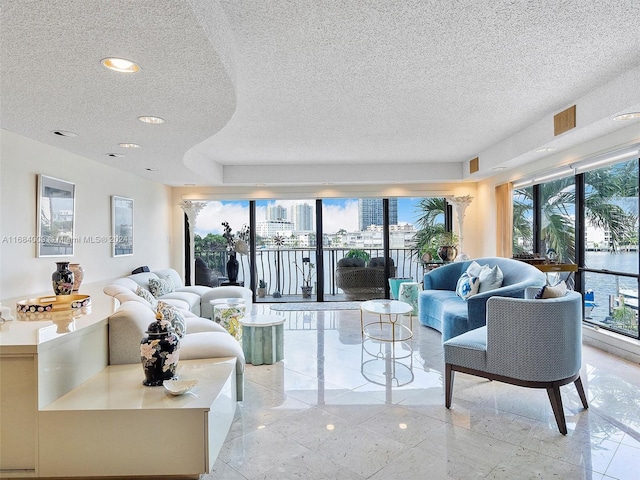 living room with a textured ceiling