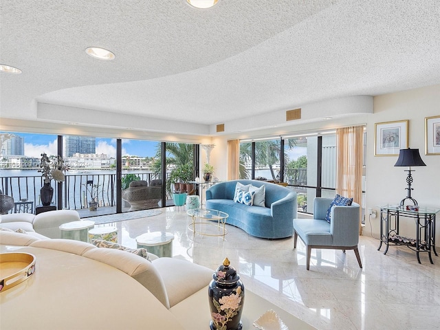 living room featuring a textured ceiling