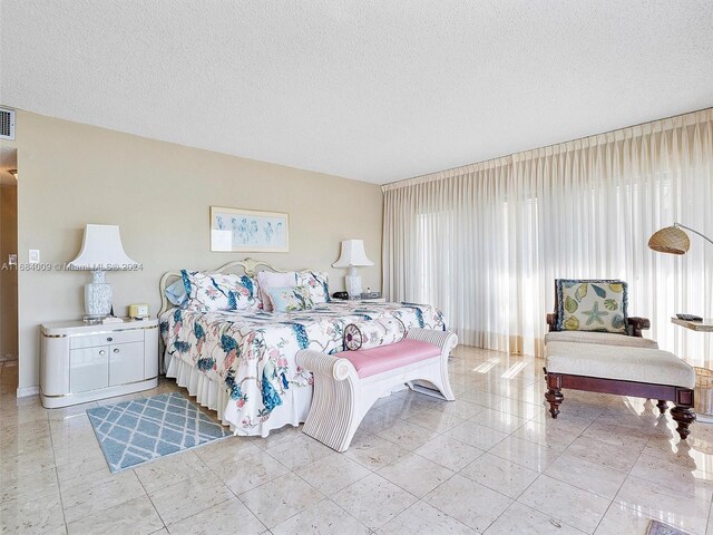 bedroom with a textured ceiling