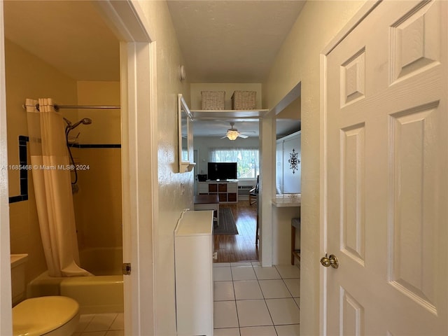 corridor with light hardwood / wood-style flooring