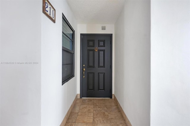 3100 NE 48th St Unit 210, Fort Lauderdale, FL 33308 - property entrance with stucco siding