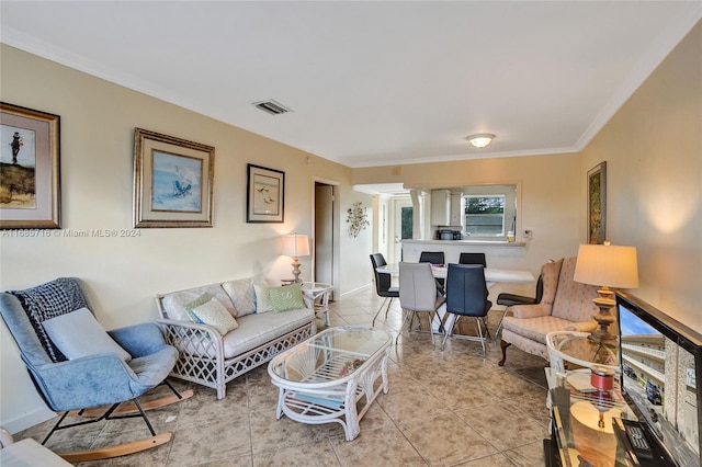 tiled living room with crown molding