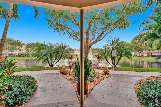 view of patio featuring a water view