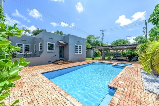 view of swimming pool featuring a pergola, a patio, and an in ground hot tub