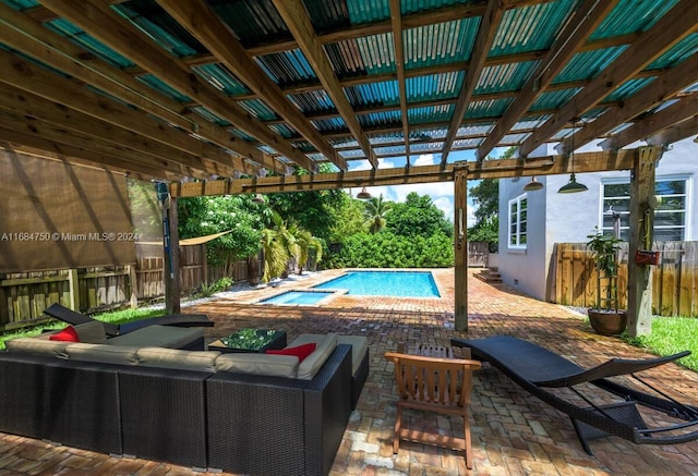 view of swimming pool with outdoor lounge area and a patio