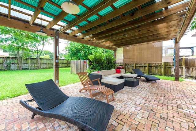 view of patio / terrace with an outdoor living space and a pergola