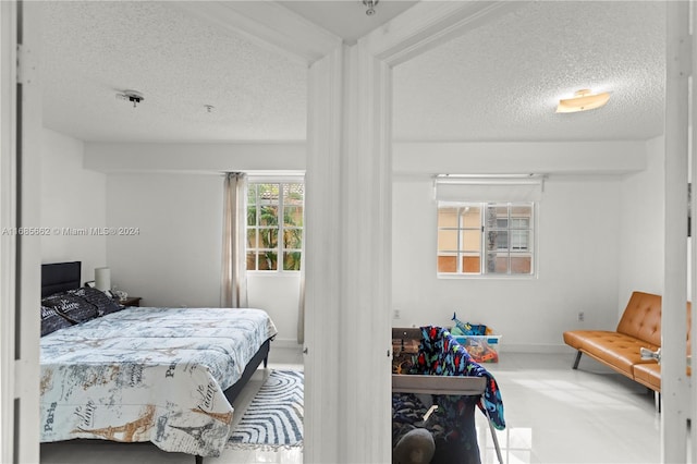 bedroom with a textured ceiling