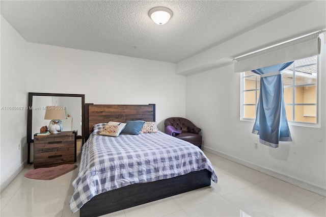 bedroom with a textured ceiling