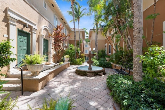 surrounding community featuring a patio area