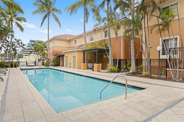 view of swimming pool featuring a patio area