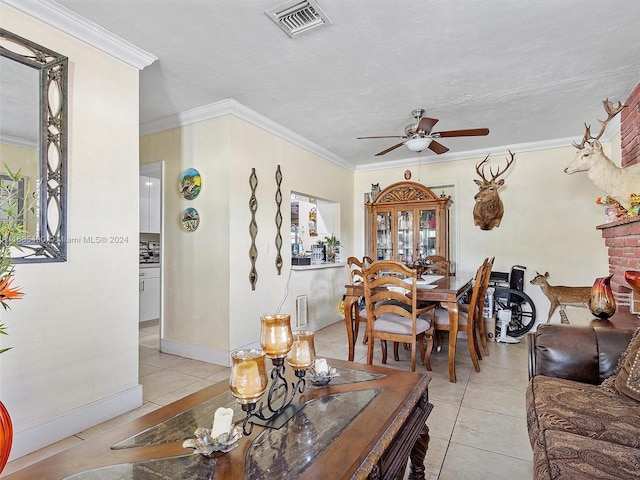 710 E 39th St, Hialeah, FL 33013 - dining area featuring light tile patterned floors, a ceiling fan, ornamental molding, and baseboards