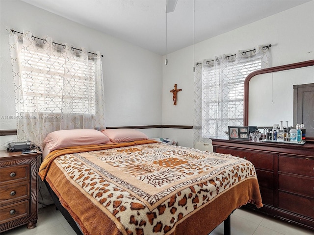 710 E 39th St, Hialeah, FL 33013 - bedroom featuring light tile patterned floors
