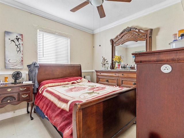 bedroom featuring crown molding and ceiling fan