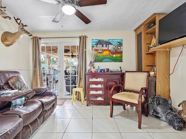 710 E 39th St, Hialeah, FL 33013 - sitting room featuring a ceiling fan, light tile patterned flooring, and french doors