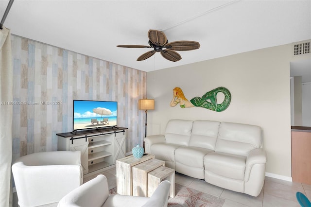 living room with light tile patterned flooring and ceiling fan